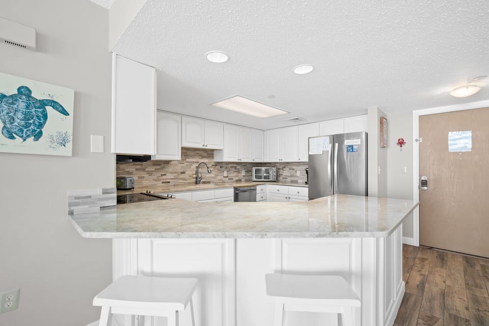 Enjoy cooking in the fully equipped kitchen with high-end appliances