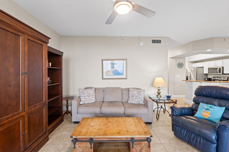 Another view of the well-appointed living space with comfortable furniture.