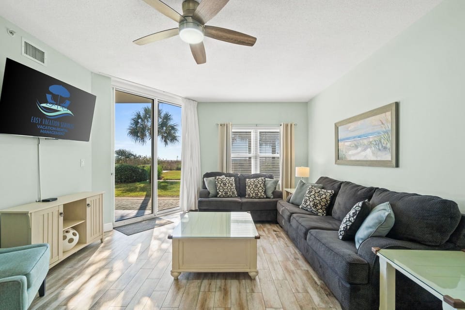 Living Area – Sleeper Sofa - Ground Floor - Courtyard View - Cable & Smart TV