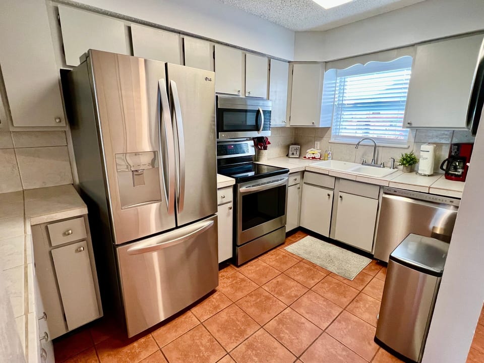 Modern kitchen with stainless steel appliances for easy meal prep