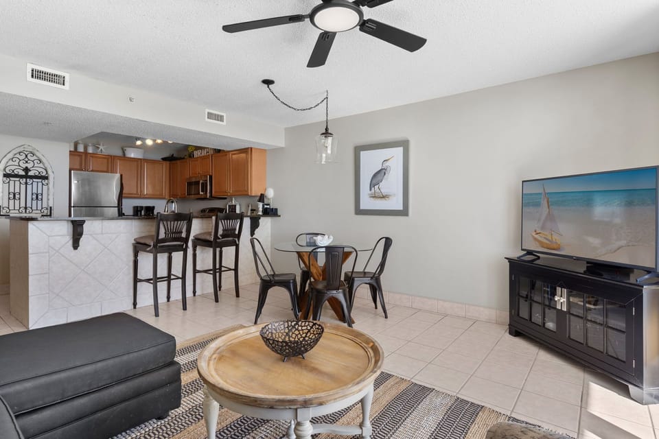 Relax in the open-concept space where kitchen, dining, and living areas flow together seamlessly for memorable gatherings.