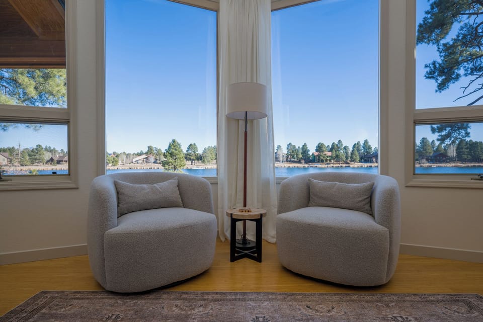 Sink into plush armchairs and let the stunning lake view through floor-to-ceiling windows become your daily backdrop for relaxation.