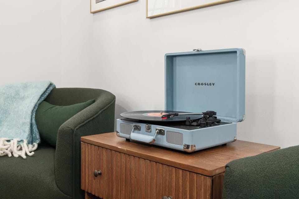 Vintage-style Crosley record player adds a fun, Nashville touch to your stay.
