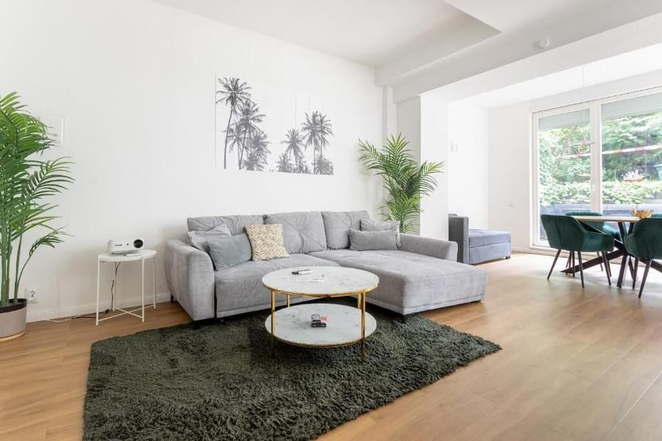 Design Condo, Kitchen, Garden View | Living area | Flat-screen TV