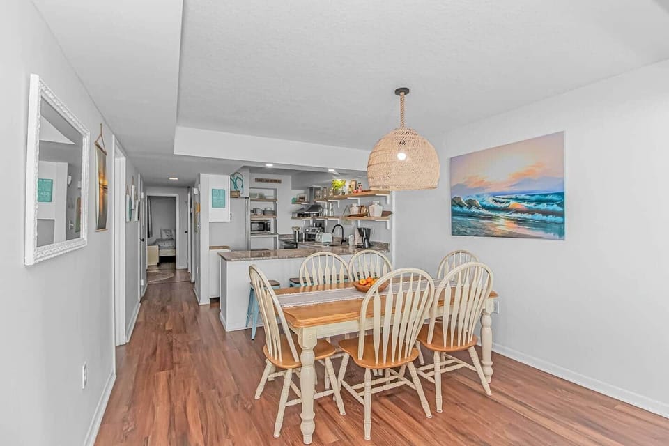 Spacious dining area just off the fully equipped kitchen — perfect for family meals and gathering together.