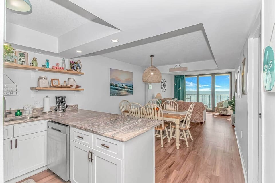 Open kitchen & dining area with oceanfront views
