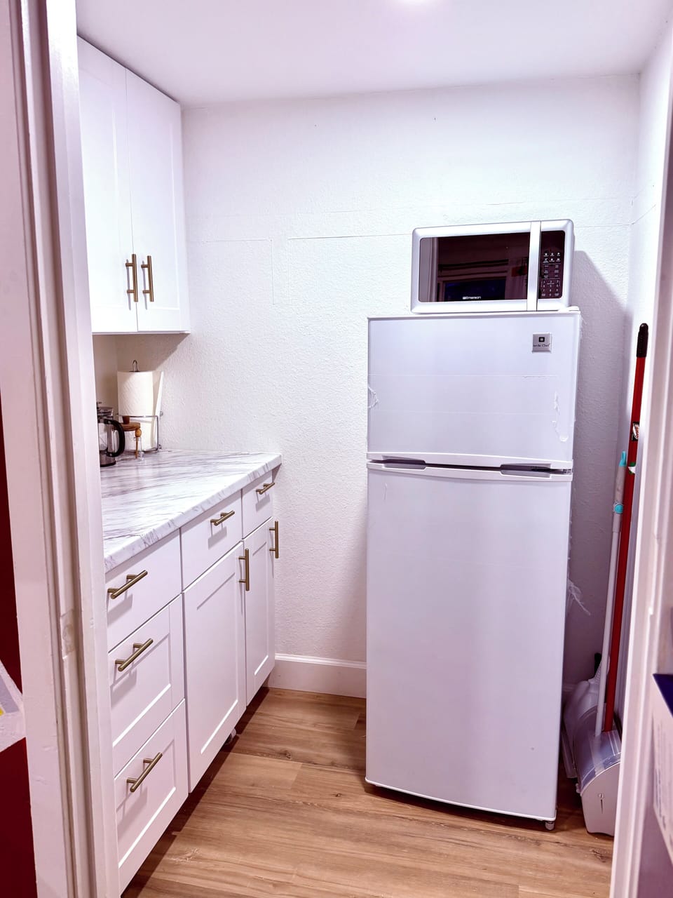 Good size refrigerator with microwave and toaster