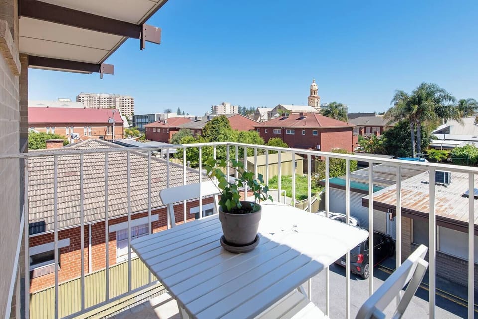 The balcony—accessed via the kitchen–is another place to relax and enjoy the ocean breeze, perfect for a morning coffee or an evening drink.