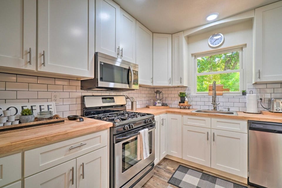 Kitchen | Stainless Appliances | White Cabinets & Butcher Block Island
