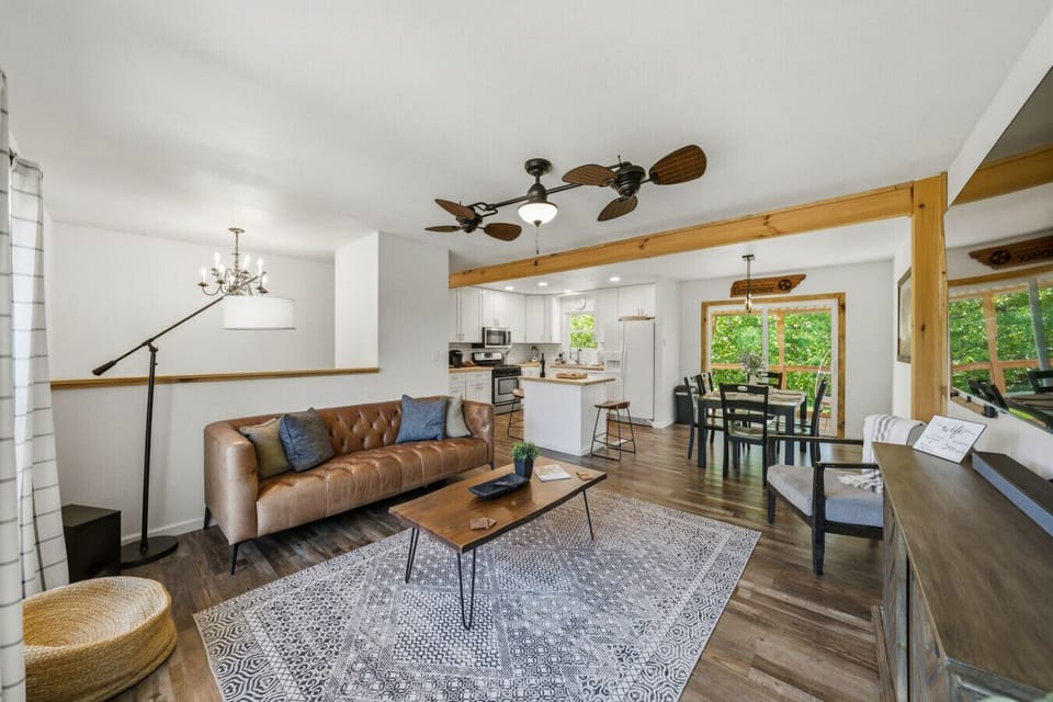 Bright Living Space | Sunlit Windows & Leather Sofa | Relaxed Everyday Comfort