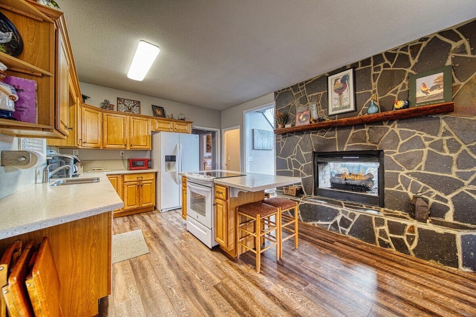 Even has a fireplace in the kitchen