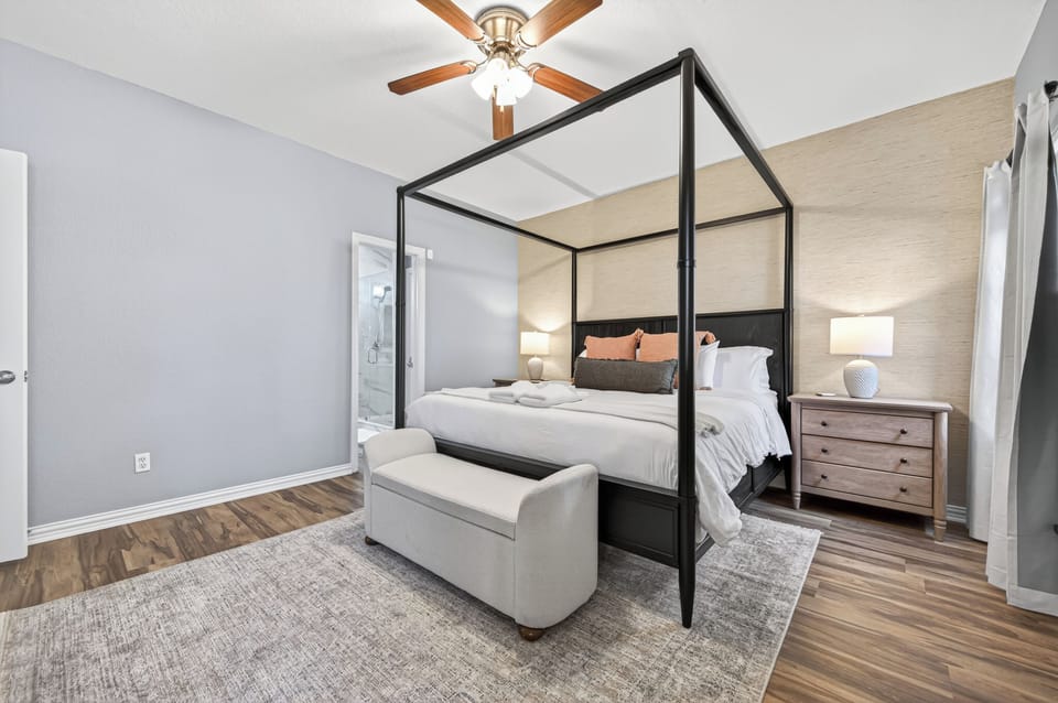 Modern elegance meets cozy comfort in this serene bedroom.