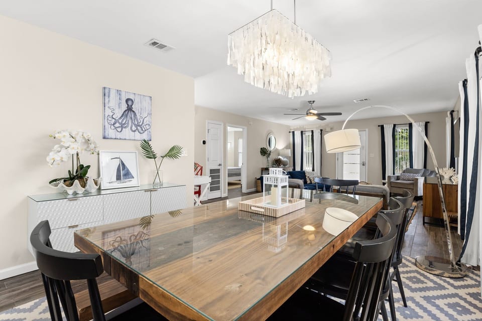 Light, bright dining space open to living room and kitchen.