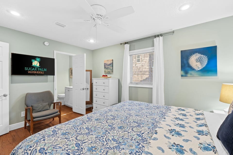 Your room includes an ensuite bath, a flat-screen TV, and coastal accents—perfect for relaxing in your own space.