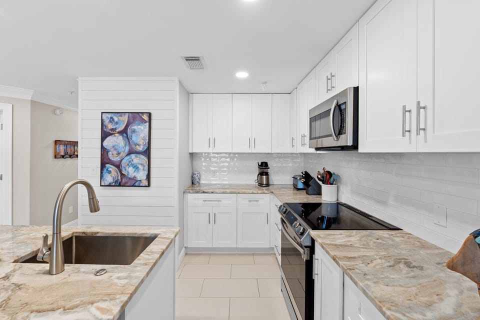 BRAND NEW KITCHEN - just completed! The washer & dryer are nearby in the hall.