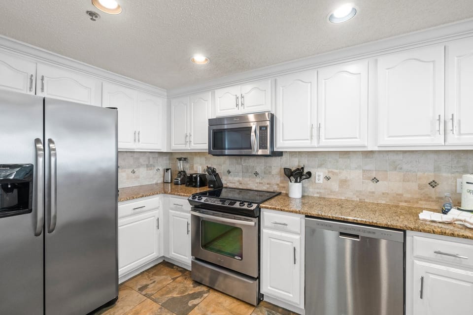 Beautiful updated kitchen with lots of counter space and custom touches.