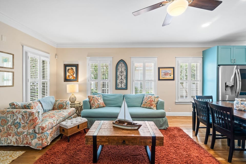 Comfortable, open floor plan with original wood floors.