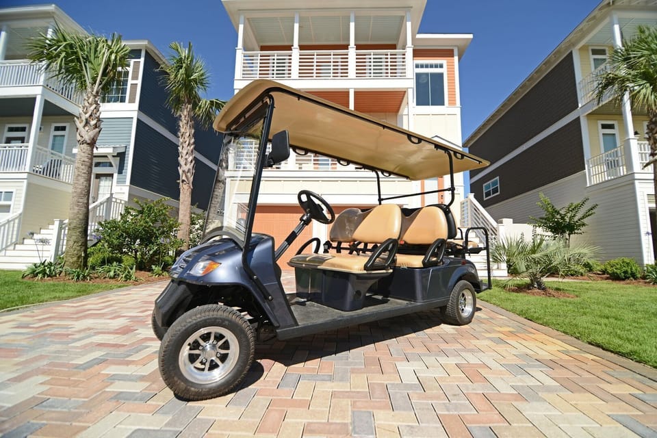 Complimentary golf cart included — enjoy easy, breezy rides to the beach, neighborhood spots, and nearby dining during your stay.
