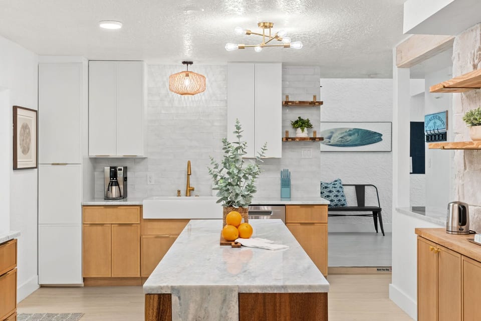 Sleek & clean modern kitchen with pop of color