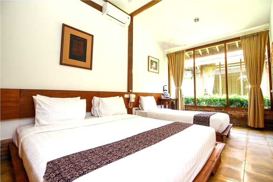 Superior Triple | Premium bedding, in-room safe, desk, free WiFi