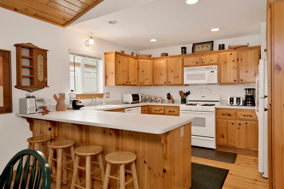 sit at the counter with 4 barstools