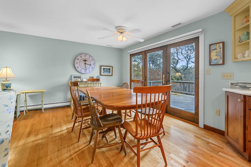 Dining table with seating  with view of deck