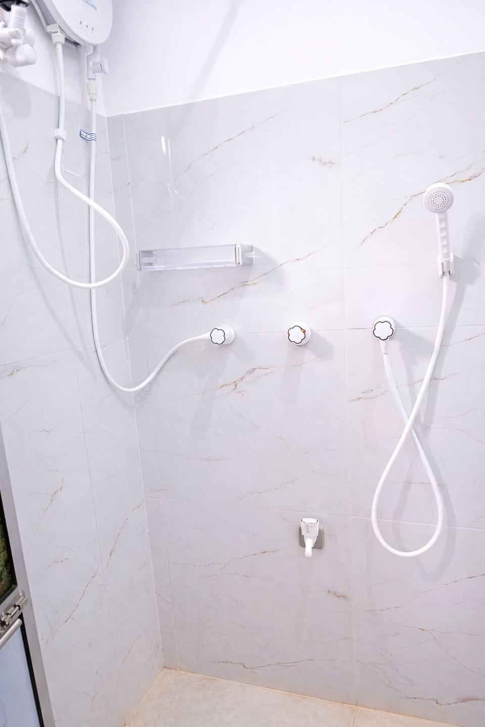 Shower, towels, soap, toilet paper