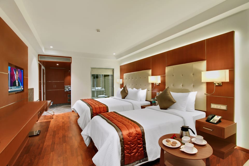 Egyptian cotton sheets, premium bedding, minibar, in-room safe