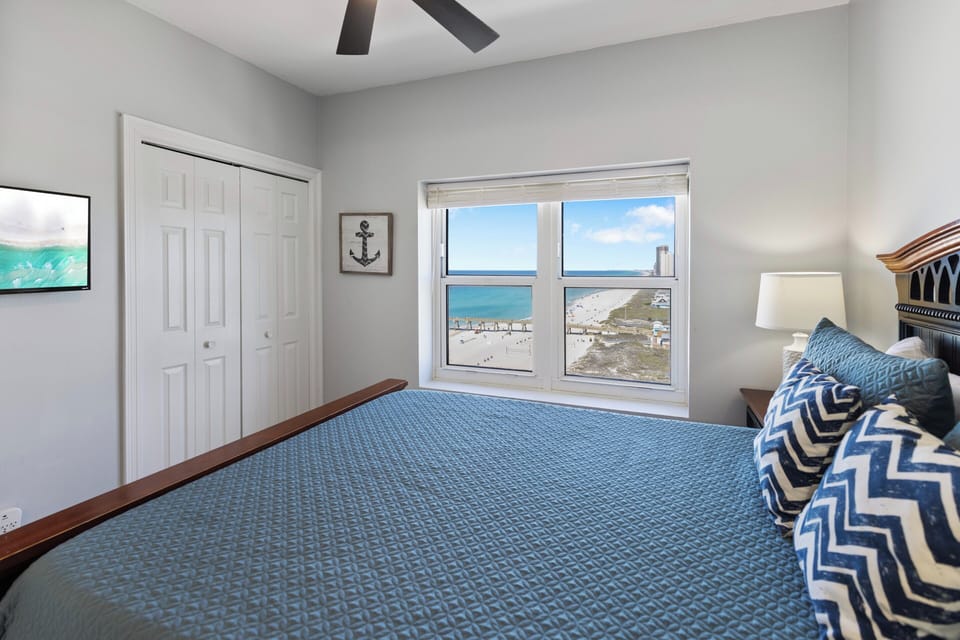 Wake up to breathtaking ocean views from your cozy bedroom, where coastal blues meet pristine beach vistas right outside your window.