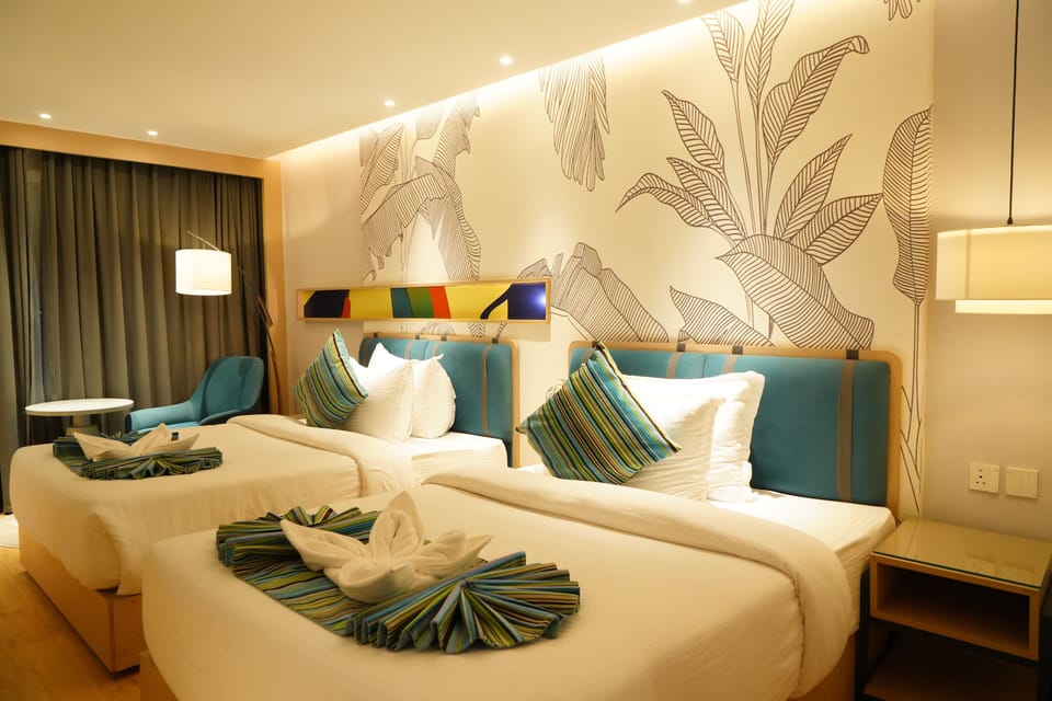 Deluxe Twin Room, 2 Twin Beds, City View | In-room safe, desk, iron/ironing board, free WiFi