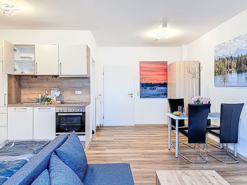 Apartment, Furniture, Hardwood, Couch, Hotel, Chair, Wood Stain, Wood Flooring, Balcony