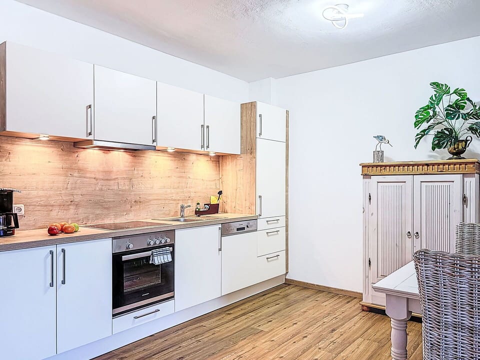 Flooring, Wood, Interior Design, Floor, Wood Flooring, Kitchen, Major Appliance, Furniture, Countertop, Cabinetry