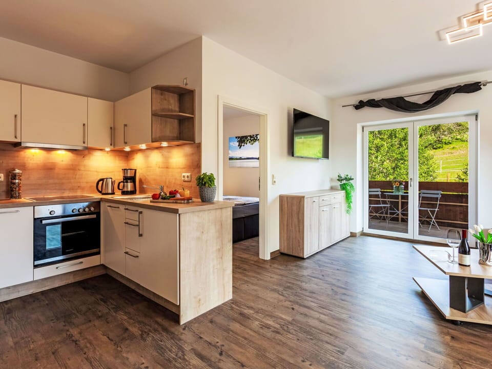 Furniture, Interior Design, Flooring, Wood Flooring, Wood, Floor, Kitchen, Room, Countertop, Ceiling