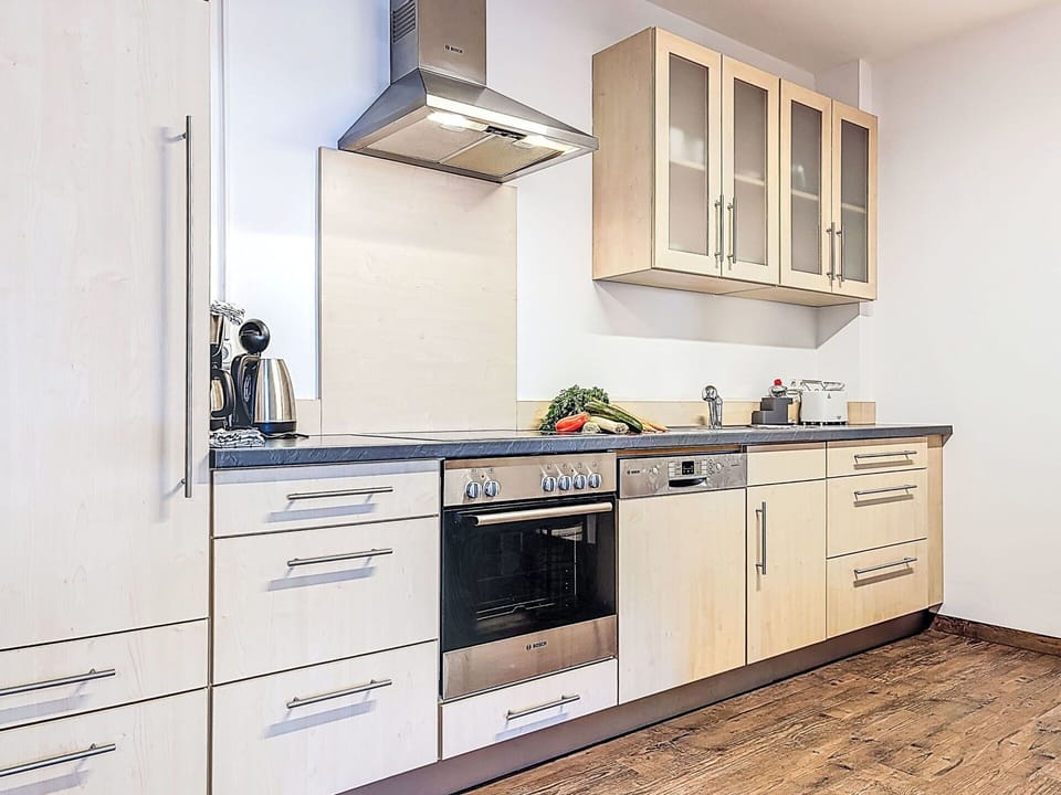 Kitchen Appliance, Cabinetry, Wood, Kitchen, Flooring, Countertop, Major Appliance, Furniture, Interior Design, Drawer