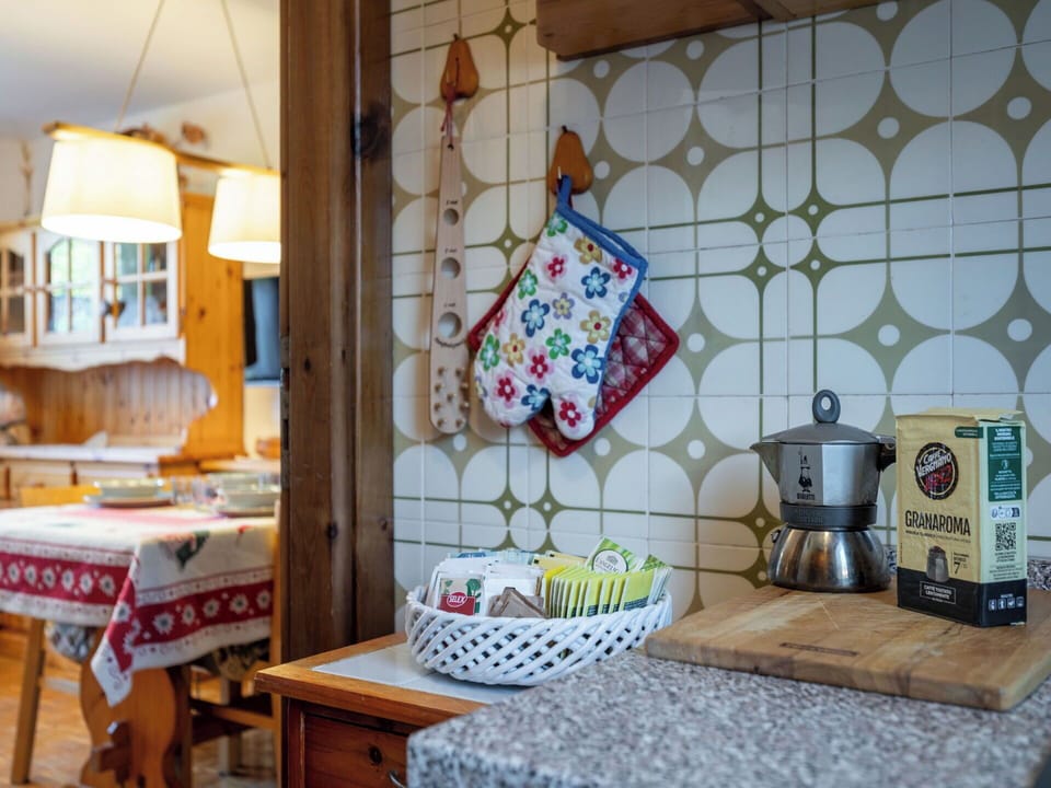 Interior Design, Kitchen, Flooring, Ceiling, Furniture, Cabinetry, Room, Countertop, Cupboard, Light Fixture