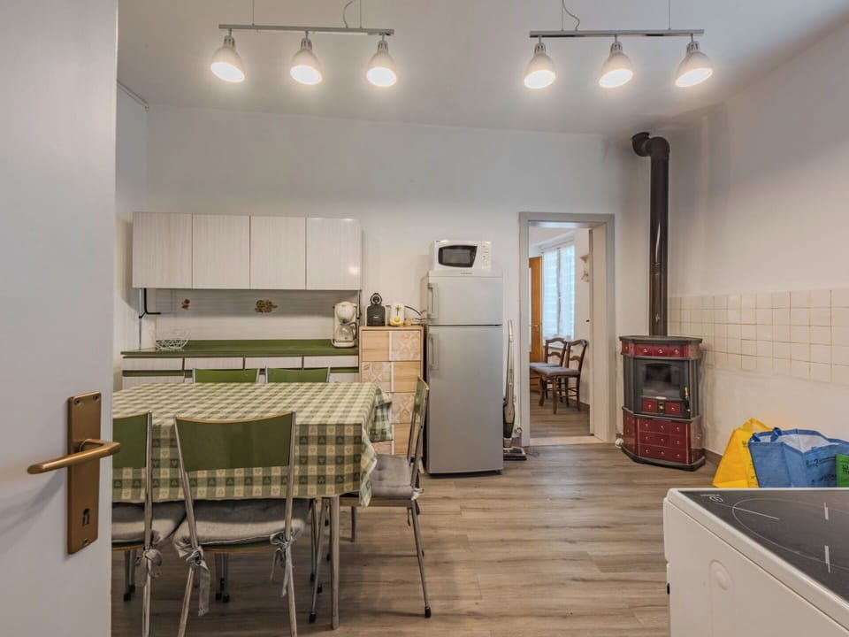 Flooring, Interior Design, Furniture, Ceiling, Floor, Wood, Light Fixture, Room, Lighting, Apartment