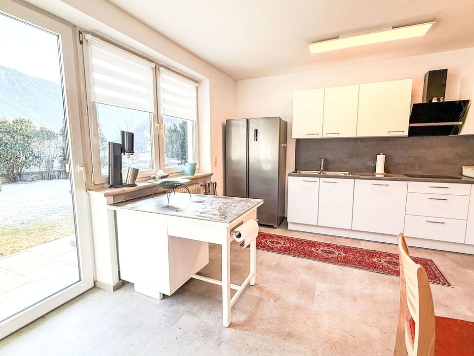 Kitchen, Flooring, Furniture, Interior Design, Countertop, Wood, Kitchen Appliance, Cabinetry, Floor, Major Appliance
