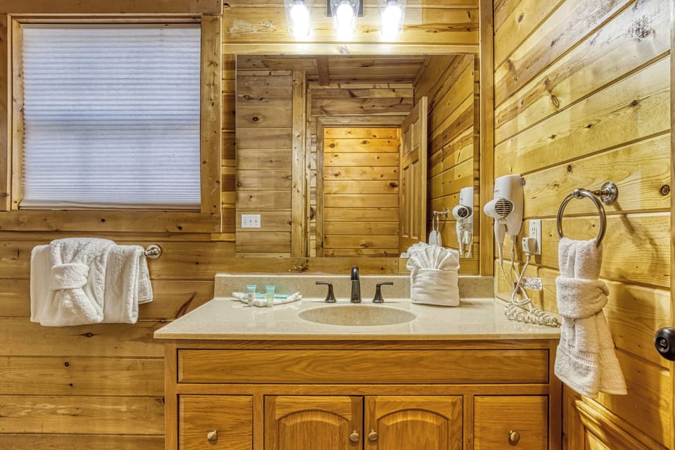 Cabin with a Hot Tub in Gatlinburg "Ole Red" - Upper level bathroom with single vanity