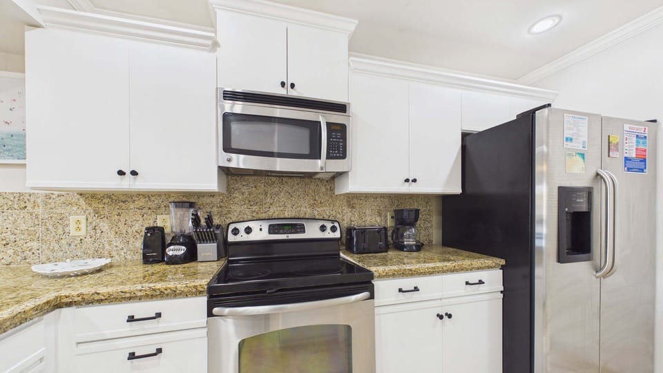 Appliances and coffee essentials in kitchen for your stay