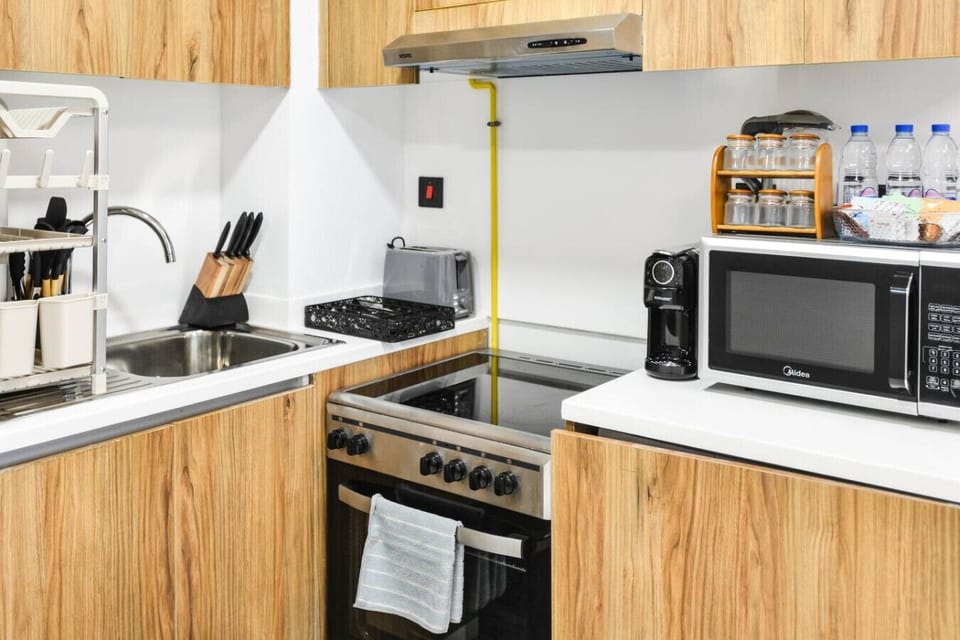 Our well-appointed kitchen combines style and practicality, offering all the tools and space you need to cook, serve, and enjoy meals with ease.