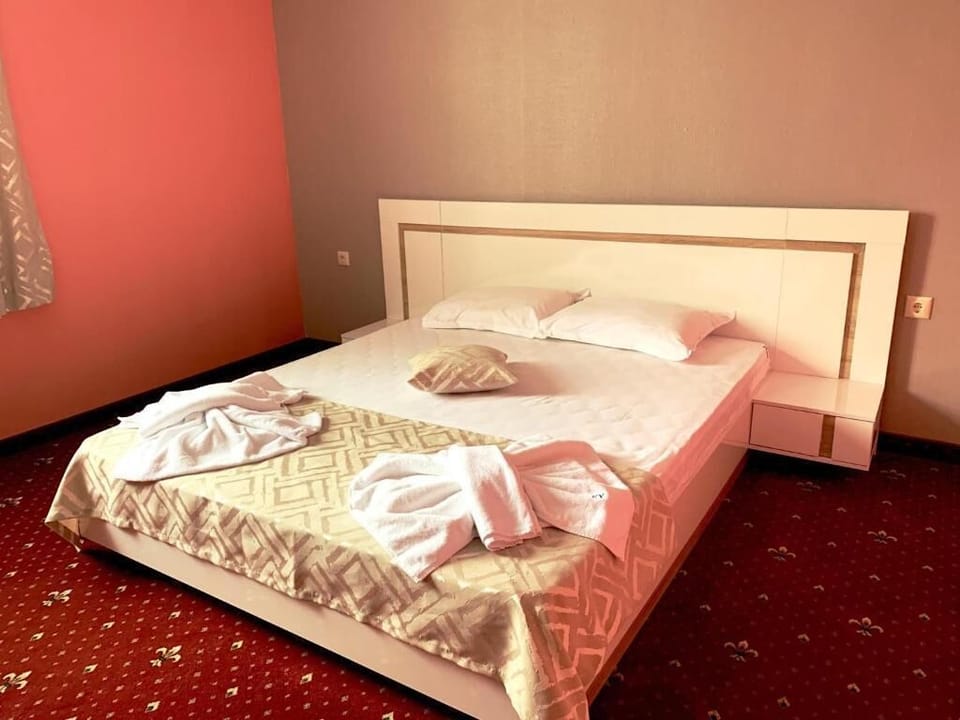 Family Suite, Balcony, Courtyard View | In-room safe, laptop workspace, iron/ironing board, free WiFi