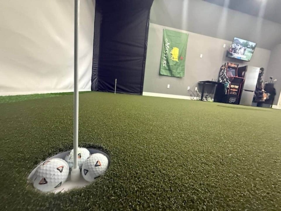 Real putting cups to practice putting