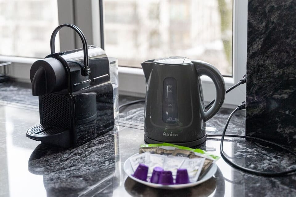 Kitchen Amenities – Coffee Machine and Electric Kettle for Your Morning Comfort | Book Now with RENTUJEMY.COM