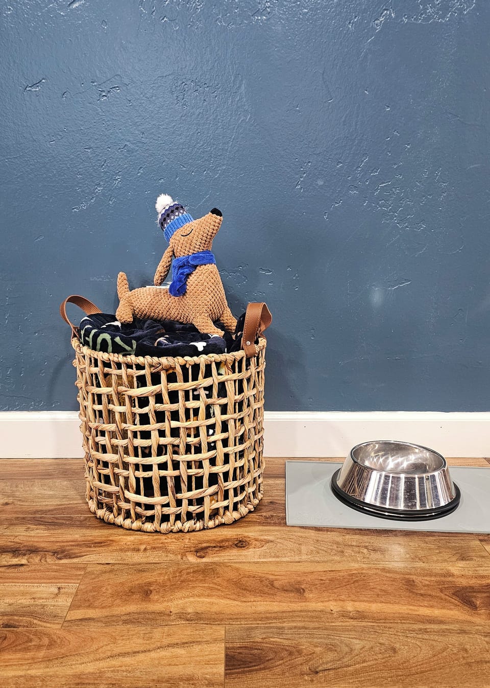Dog friendly home with two dog blankets, and bowl for your furry friends. 