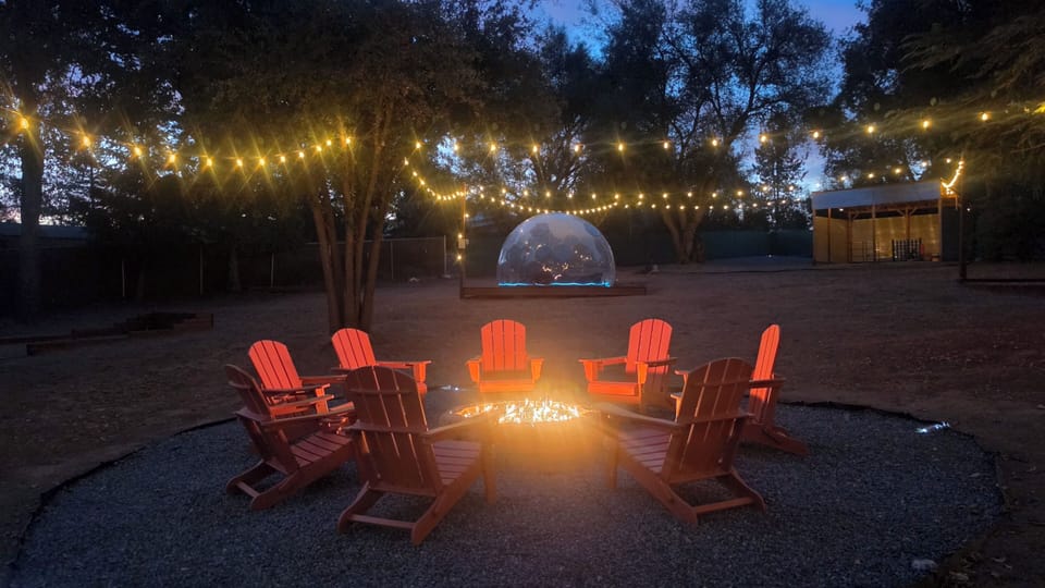 Enjoy the firepit and the dome in the backyard