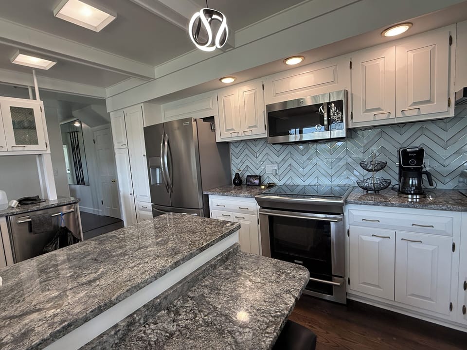 Updated Kitchen with stove, range, microwave, indoor BBQ