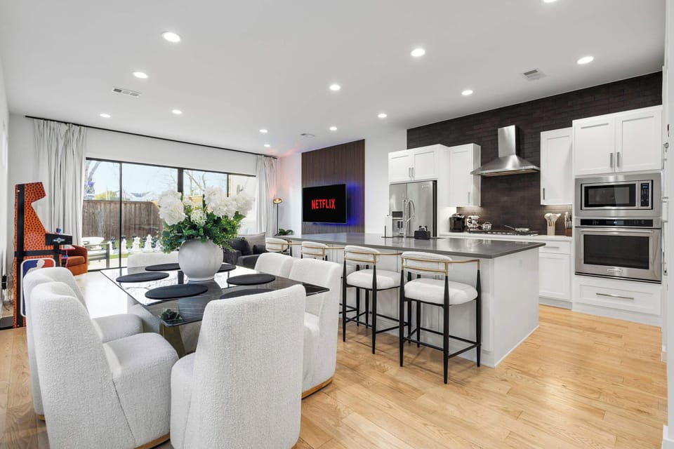 Gather around the dining table for shared meals, game nights, or planning your next adventure. Comfortable seating and an open layout create a welcoming space for meaningful moments.