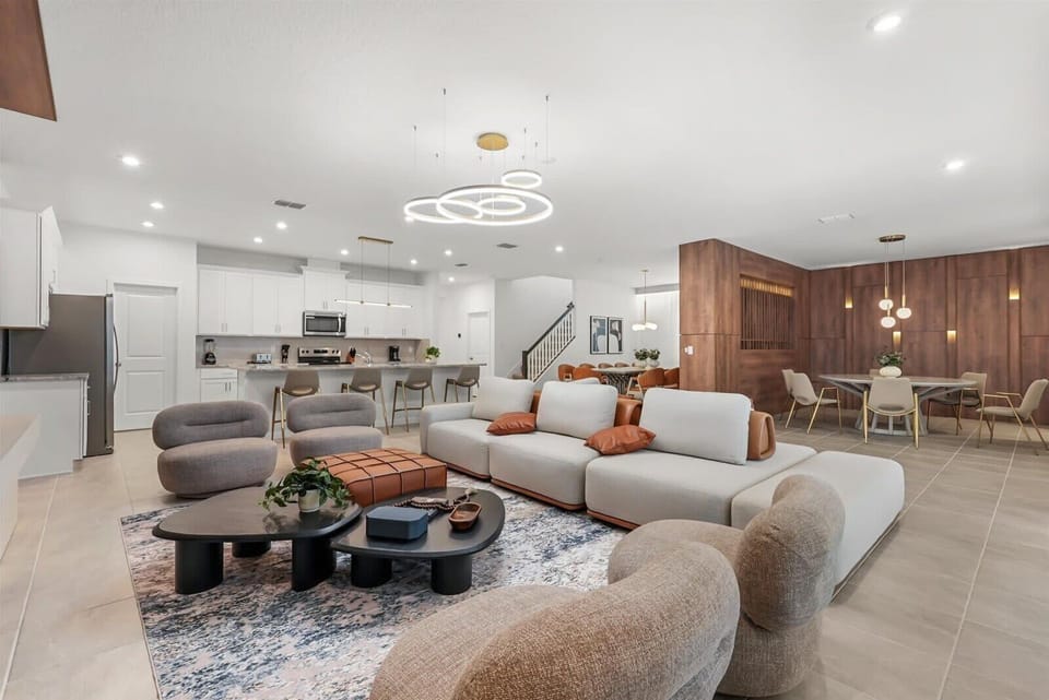 Modern open-concept living area with a spacious kitchen and stylish seating.