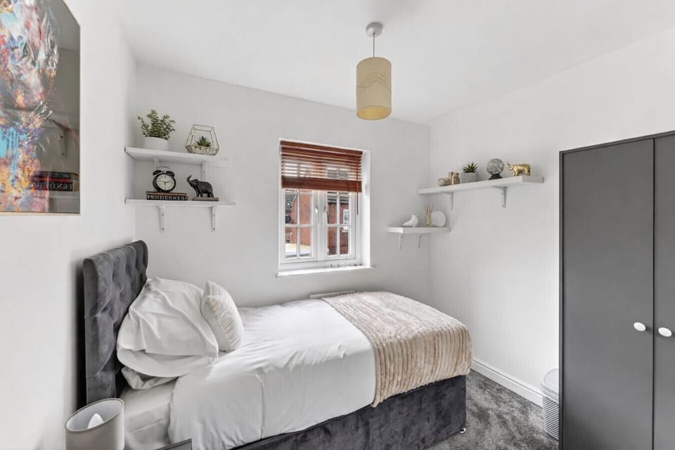 Bedroom 4 features a single bed with fresh linen and towels provided.