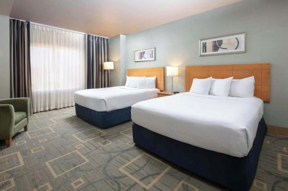 Deluxe Room, City View | Individually decorated, individually furnished, laptop workspace